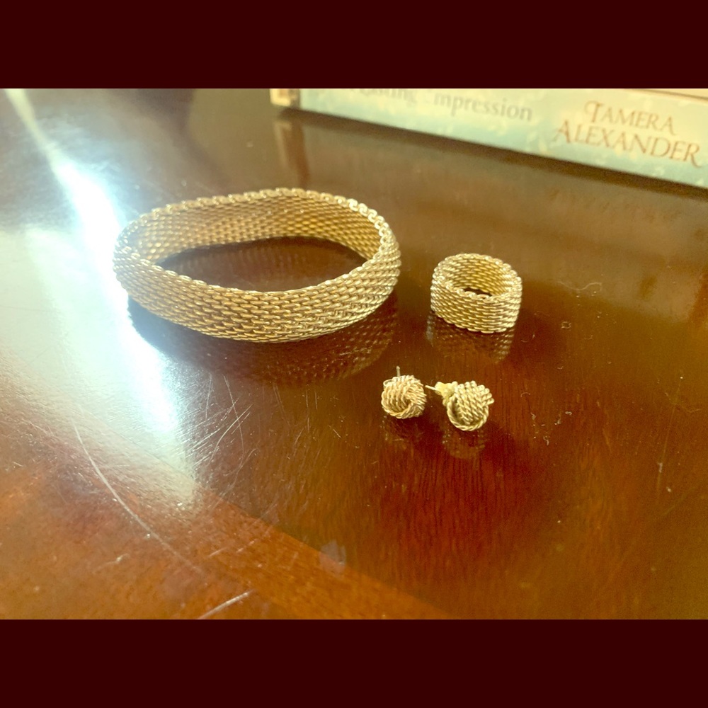 Tiffany & Co bracelet, ring, and knot earrings